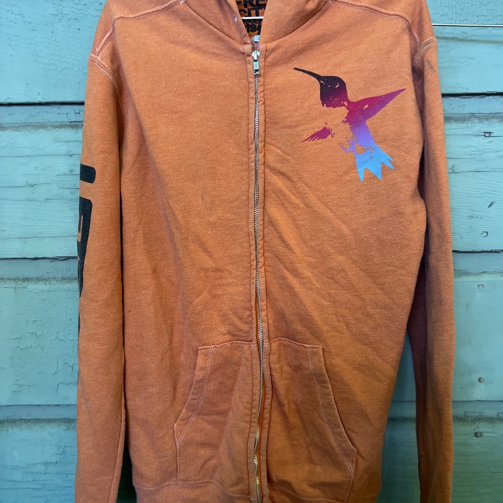 Free city Orange Zip-Up Hoodie with Bird Graphic